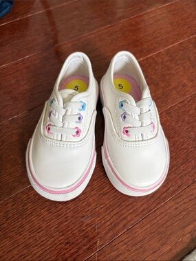 NWOT baby White Canvas Slip-on Sneakers with Pink Accent, size 5